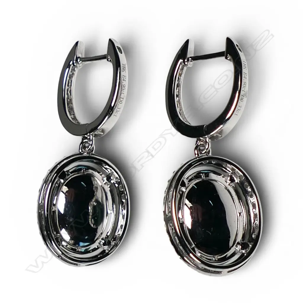 A pair of 18ct white gold diamond and emerald earrings, Image 1++