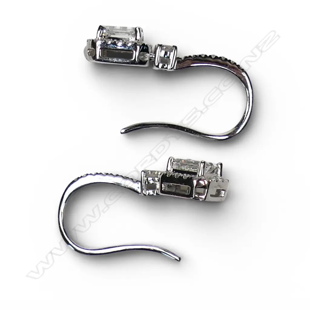 A pair of 18ct white gold and diamond earrings, Image 1++