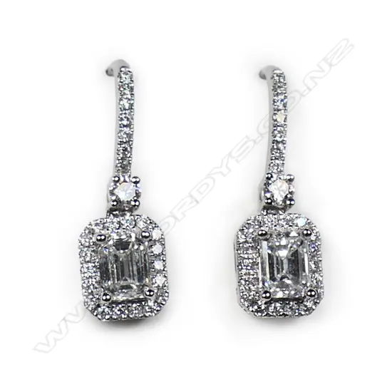 A pair of 18ct white gold and diamond earrings,