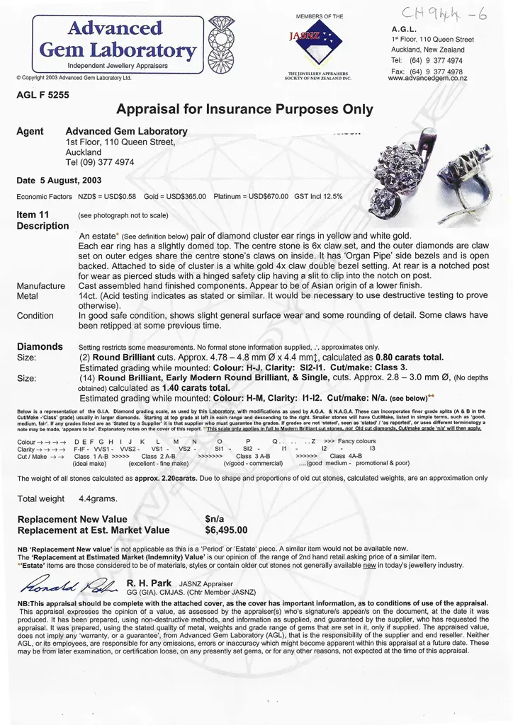 A pair of estate 14ct white gold and diamond earrings, Image 1++