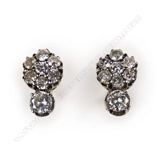 A pair of estate 14ct white gold and diamond earrings,