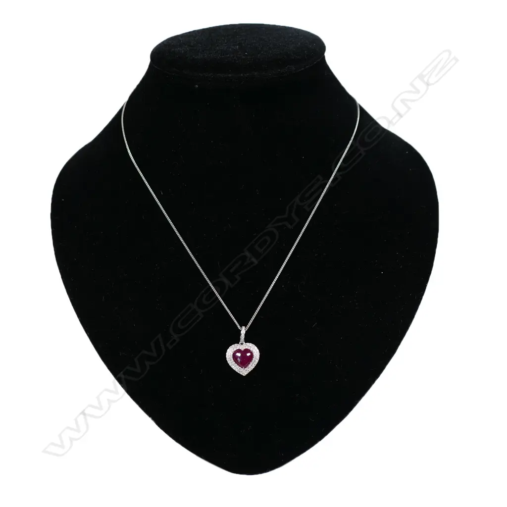 An 18ct white gold diamond and ruby pendant, Image 1++