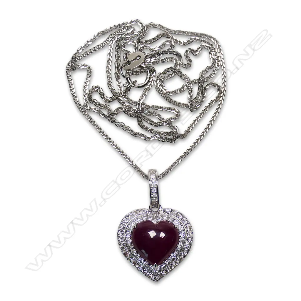 An 18ct white gold diamond and ruby pendant, Image 1++