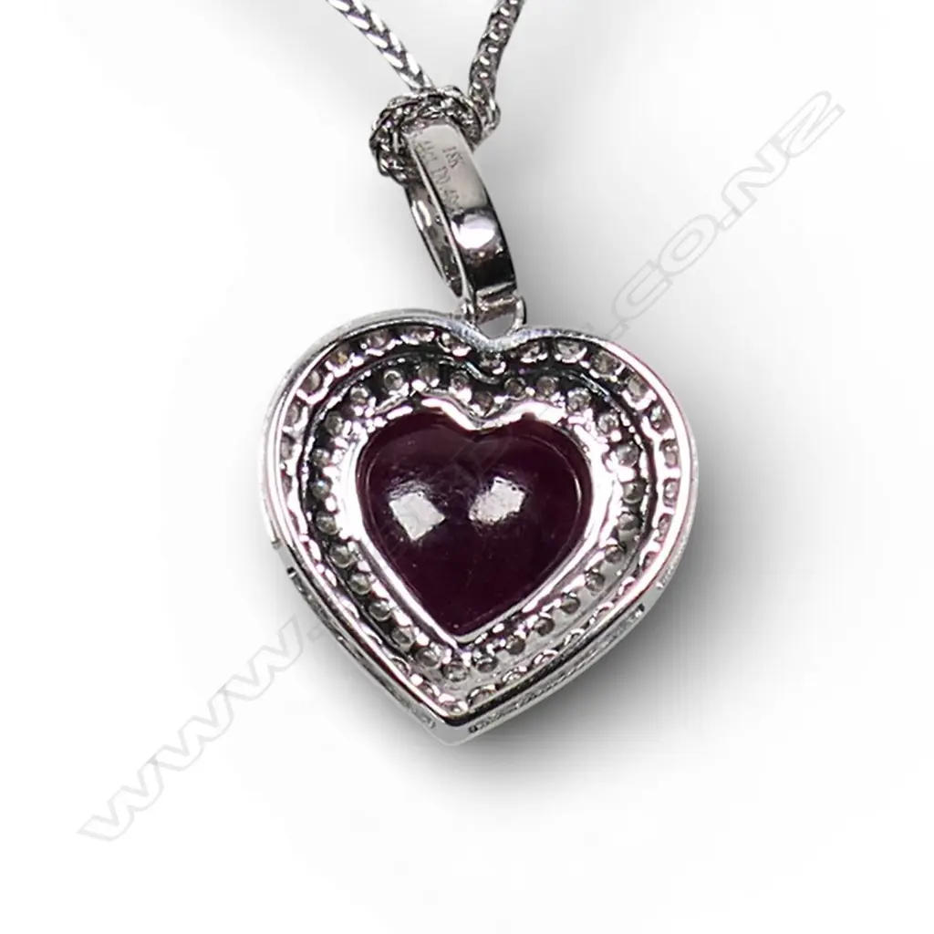 An 18ct white gold diamond and ruby pendant, Image 1++