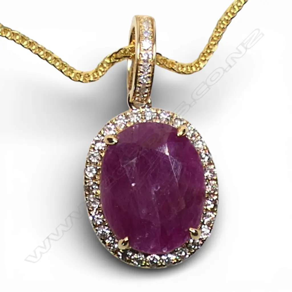 A 9ct gold ruby and diamond pendant, Image 1++