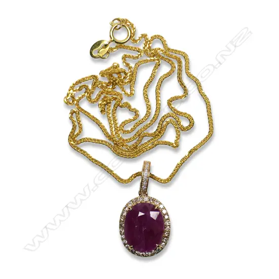 A 9ct gold ruby and diamond pendant,