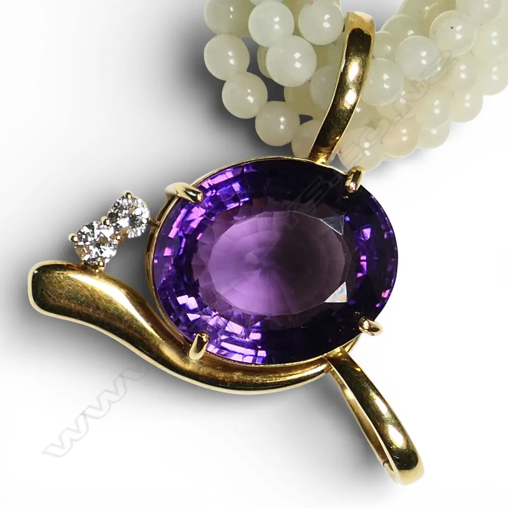 A jadeite bead necklace with 18ct gold amethyst and diamond enhancer, Image 1++