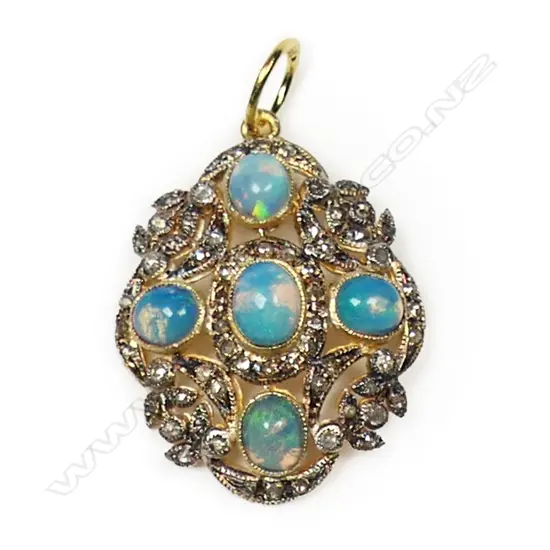 An antique style silver gilt diamond and opal pendant,