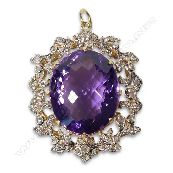 An antique style silver gilt diamond and amethyst pendant,