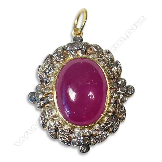 An antique style silver gilt diamond and ruby pendant,