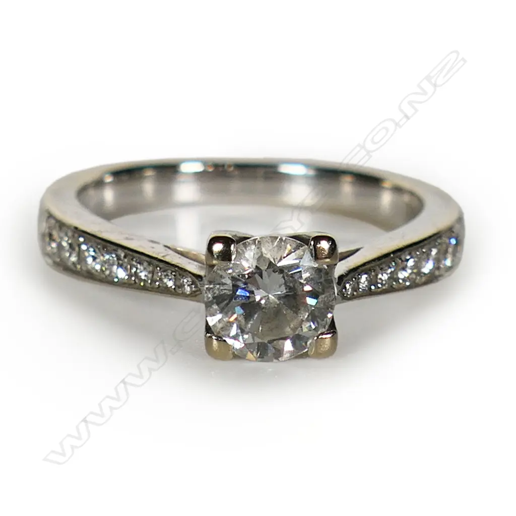 An 18ct white gold and diamond solitaire ring, Image 1++