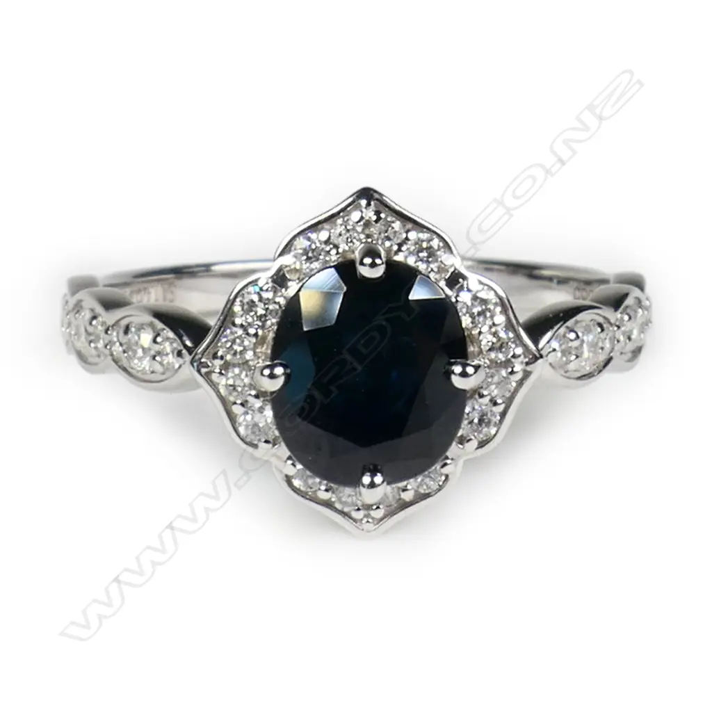 A 14ct white gold sapphire and diamond ring, Image 1++