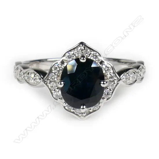 A 14ct white gold sapphire and diamond ring,