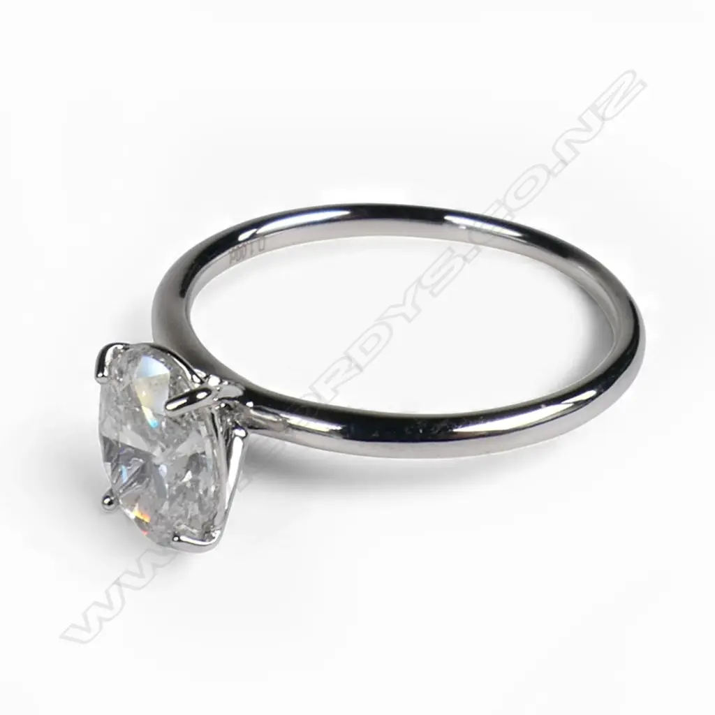 A 14ct white gold and diamond solitaire ring, Image 1++