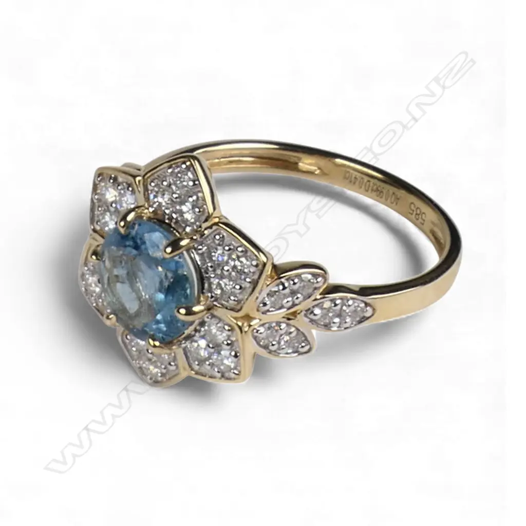 A 14ct gold aquamarine and diamond dress ring, Image 1++