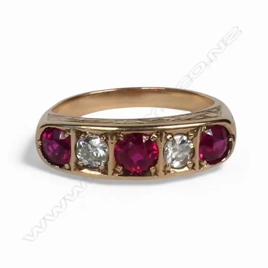 A vintage 14ct gold three synthetic ruby and two diamond ring,