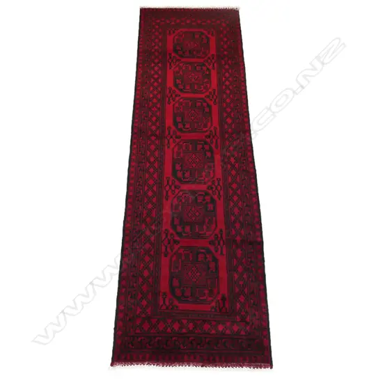 A fine hand-knotted elephant foot runner,