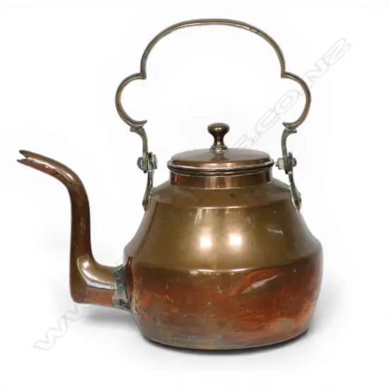A large early Victorian copper kettle,