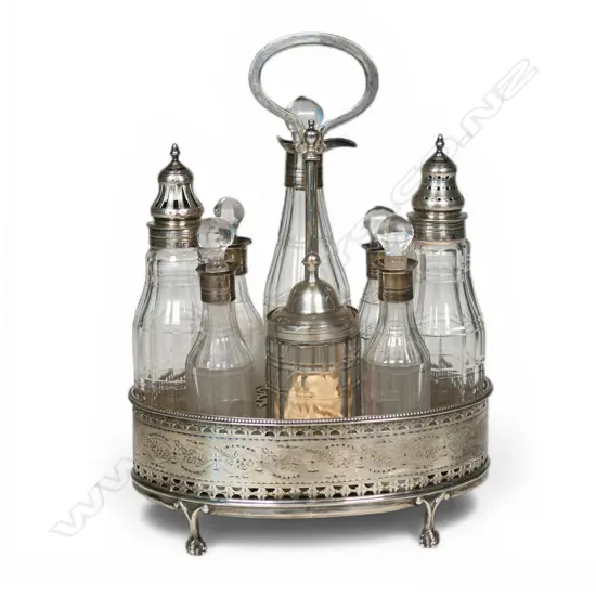 A George III sterling silver cruet set,
