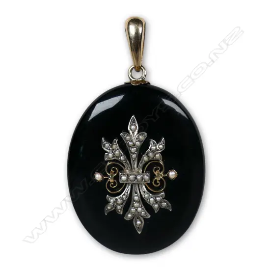 A Victorian 15ct gold; jet and seed pearl mourning locket,