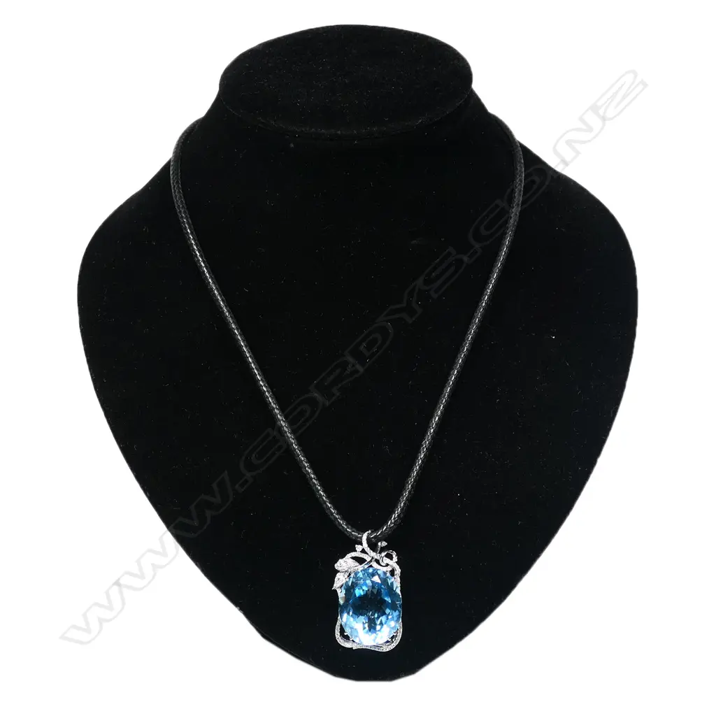 An 18ct white gold diamond and large blue topaz pendant, Image 1++