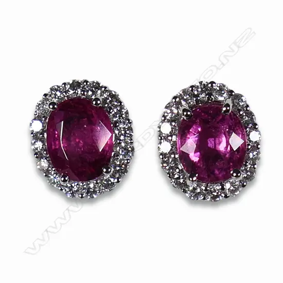 A pair of 18ct white gold diamond and pink tourmaline stud earrings,