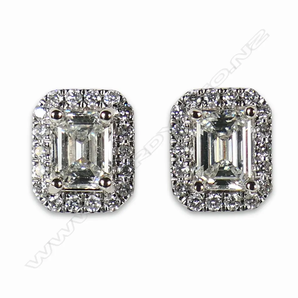 A pair of 18ct white gold and diamond stud earrings, Image 1++
