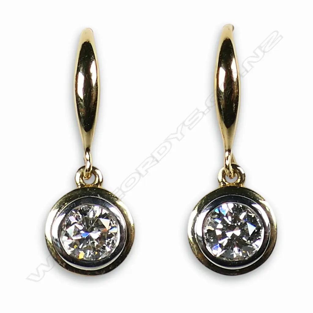 A pair of 18ct yellow and white gold and diamond drop earrings, Image 1++