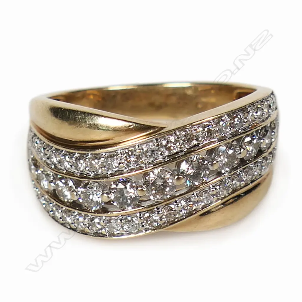 A 10ct gold and diamond dress ring, Image 1++