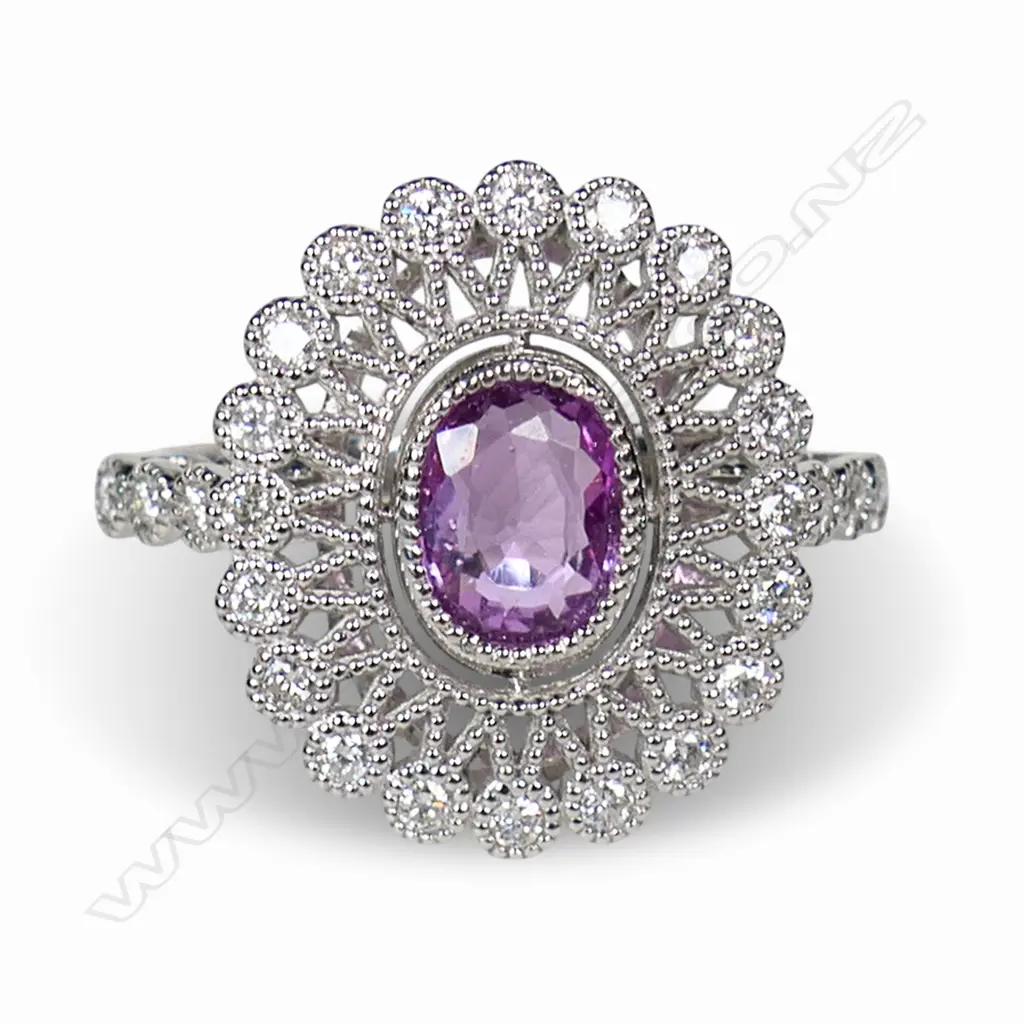 A 14ct white gold pink sapphire and diamond cluster ring, Image 1++