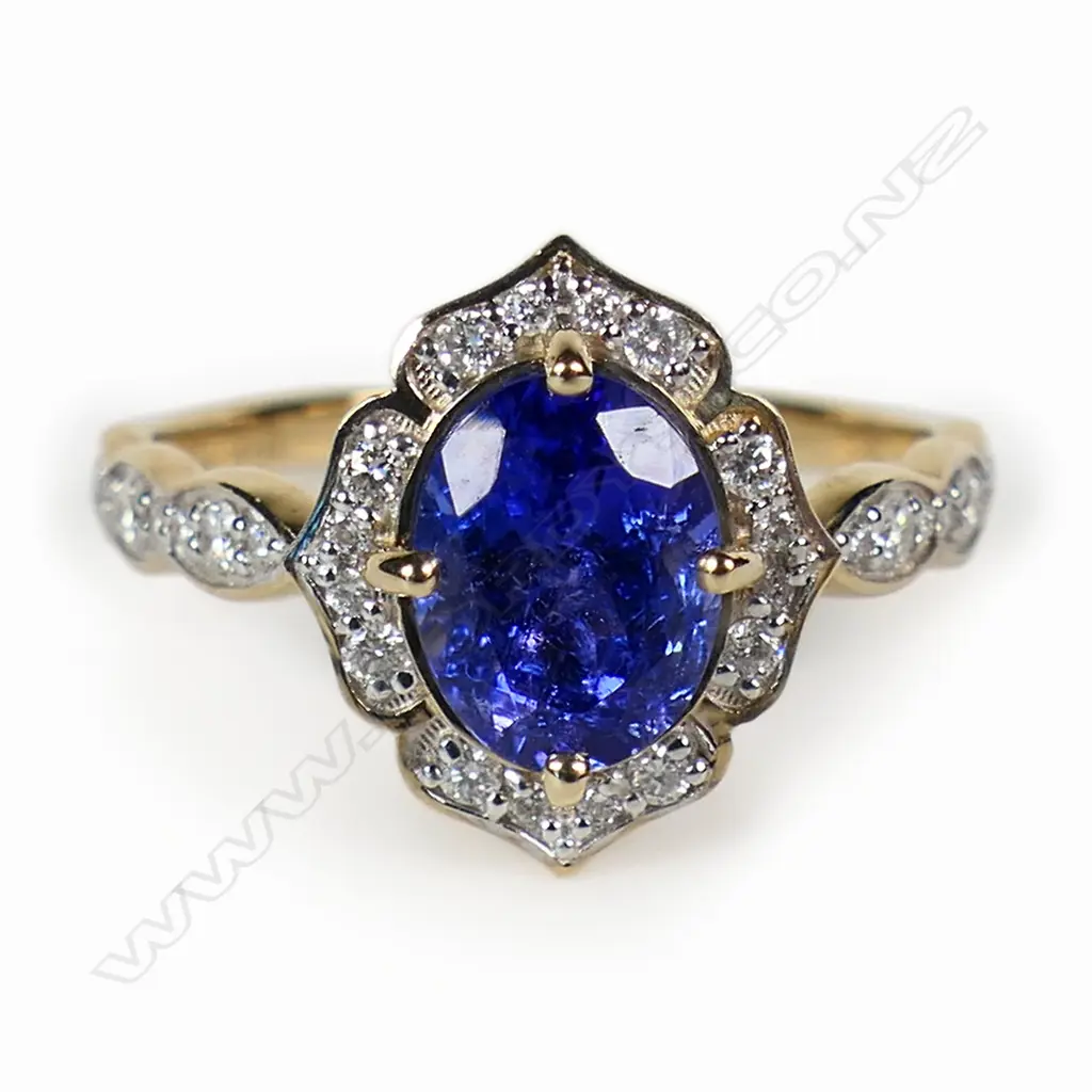 A 14ct gold tanzanite and diamond dress ring, Image 1++