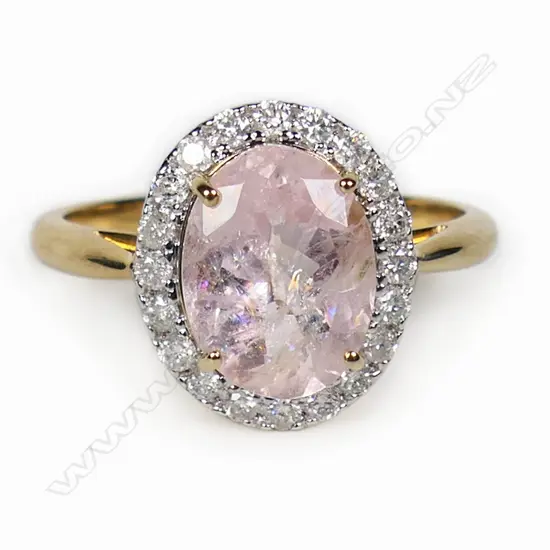 A 14ct gold morganite and diamond halo ring,