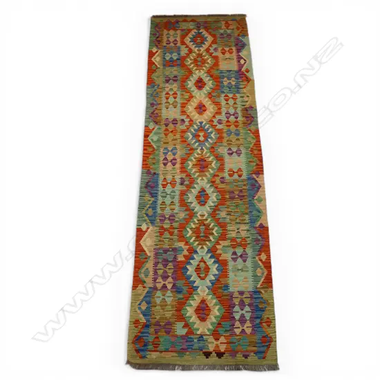 A hand-woven kelim runner,
