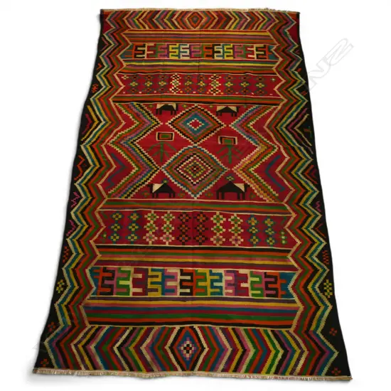 An old hand-woven Persian kelim,