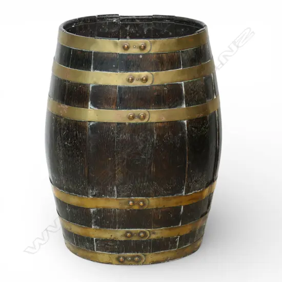 A 19thC oak and brass bound barrel stick or umbrella stand,