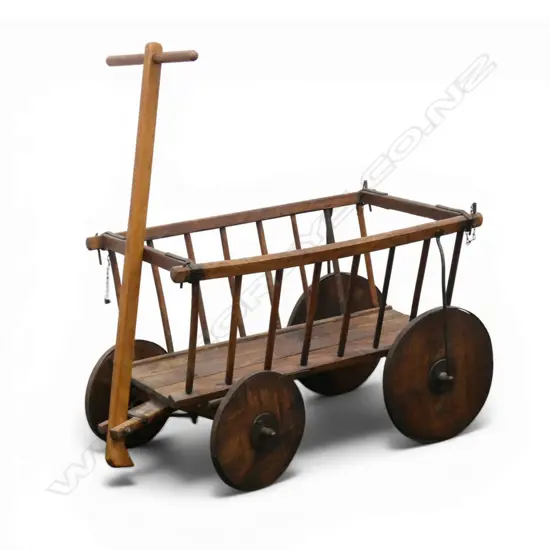 A 19thC country fruitwood dog cart,