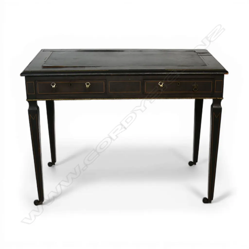 A Victorian ebonised writing table, Image 1++