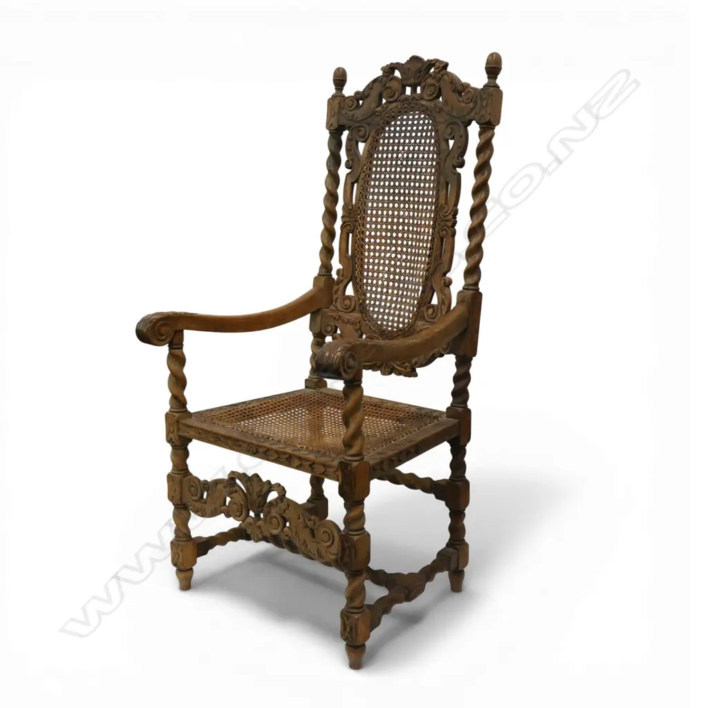 A late 19thC Jacobean style carved oak carver armchair, Image 1++