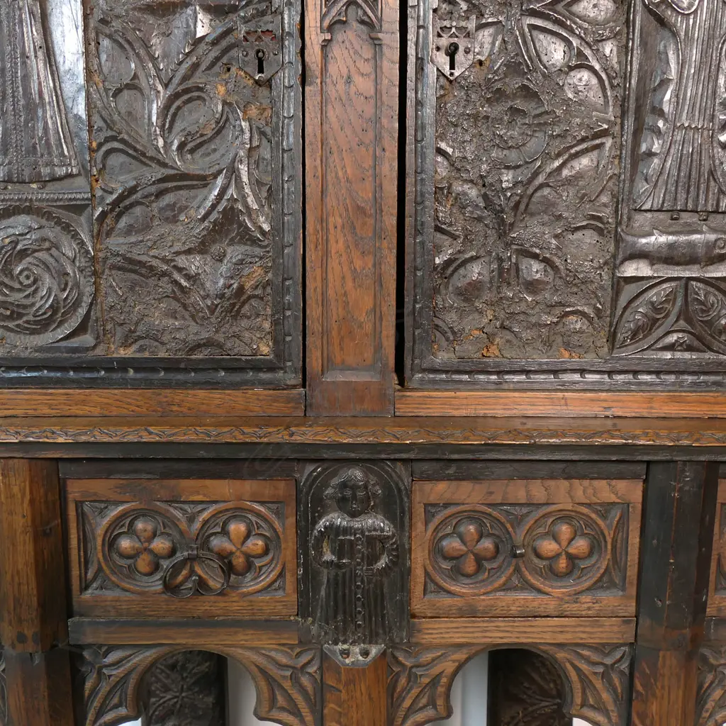 An uncommon and very decorative 19thC oak carved ecclesiastical carved cupboard on raised stand, Image 1++