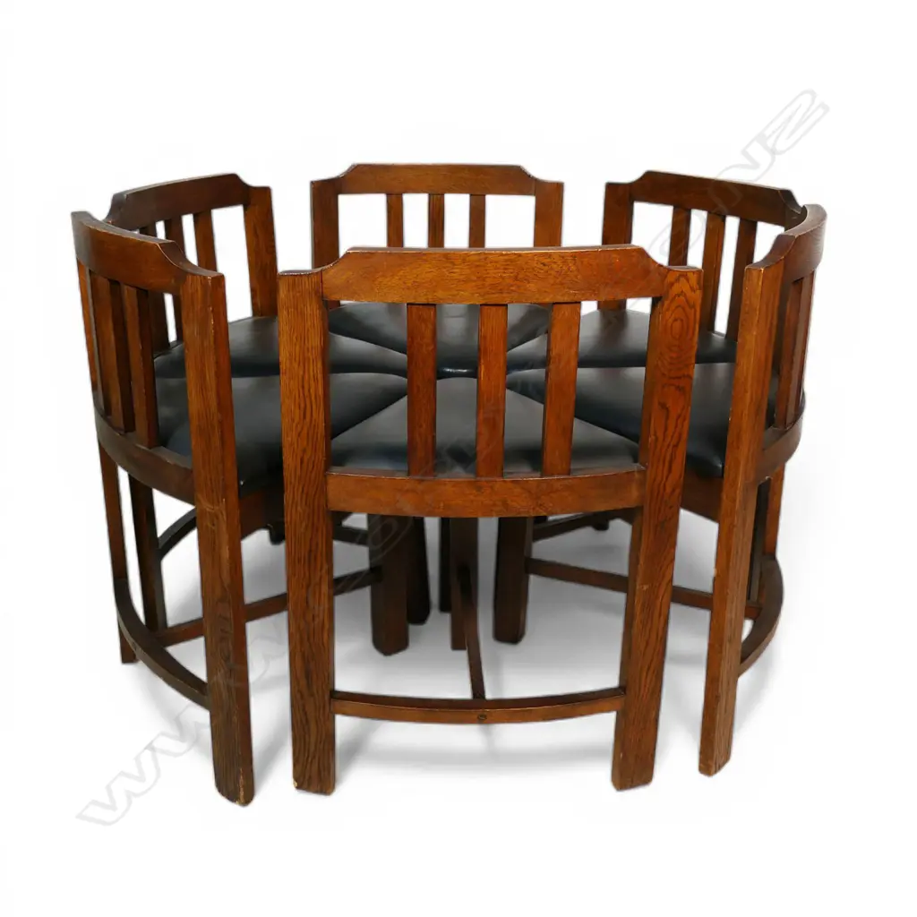 An uncommon Arts & Crafts oak hexagonal table and six shaped chair set, Image 1++