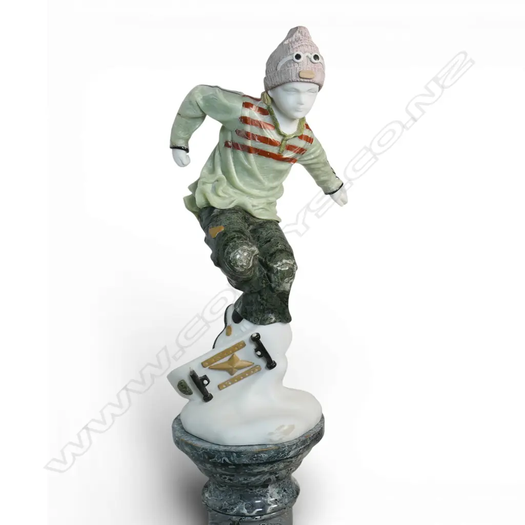 A carved coloured marble sculpture of a skateboarder, Image 1++
