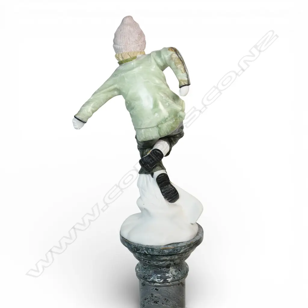 A carved coloured marble sculpture of a skateboarder, Image 1++