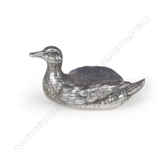 An Edwardian silver miniature pin cushion