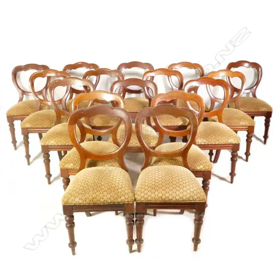 A set of sixteen Victorian mahogany balloon back dining chairs