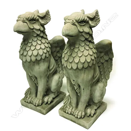 A pair of fine concrete garden/entrance griffins