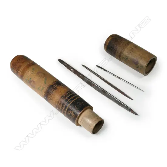 Sail-maker's needles in a decorative turned wooden needle case