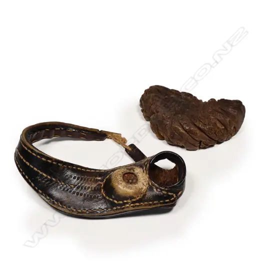 A sail-maker's leather palm thimble