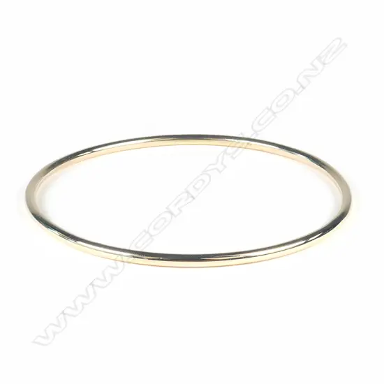 A 9ct gold bangle
