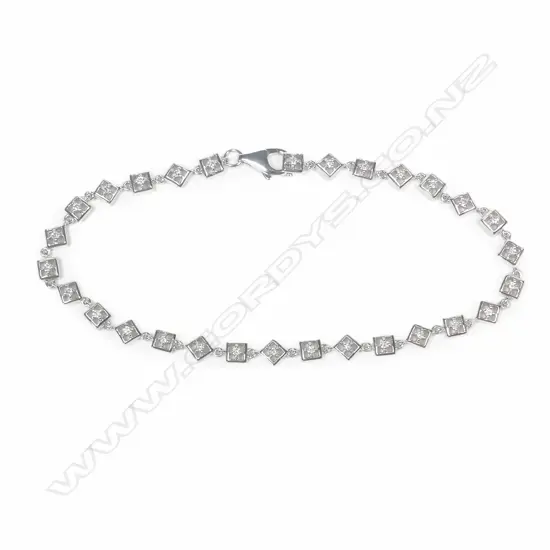 An 18ct white gold and diamond bracelet
