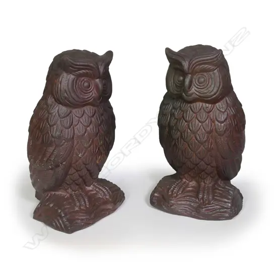 A pair of stoneware sculpted owl garden ornaments
